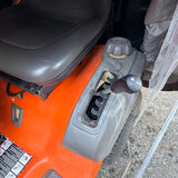 Husqvarna Gas-Powered Riding Lawn Tractor w/ Tow-Behind Spike/Plug Aerator Attachment (Orange)