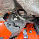 Husqvarna Gas-Powered Riding Lawn Tractor w/ Tow-Behind Spike/Plug Aerator Attachment (Orange)